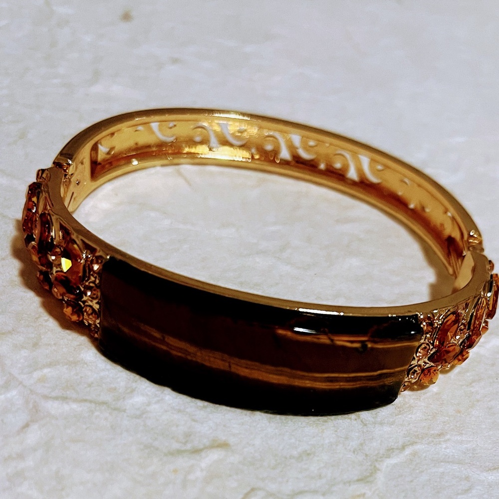 Luxurious Gold and Brown Bracelet with Intricate Design